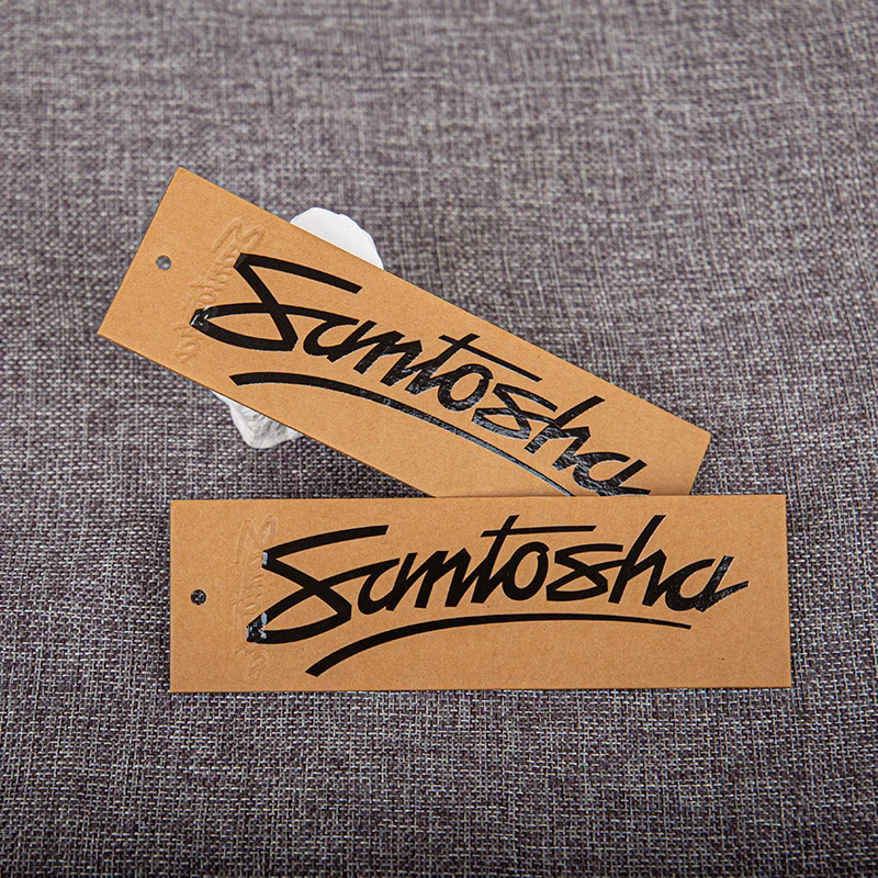 Custom Luxury Embossed Spot UV Black Hot Stamping Kraft Paper Two Side Printing  Paper Clothing Garment Hang Tag With Logo