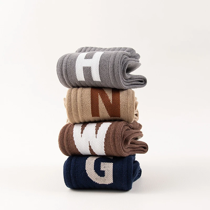 Autumn winter combed cotton jacquard embroidery sports socks custom logo women men crew socks