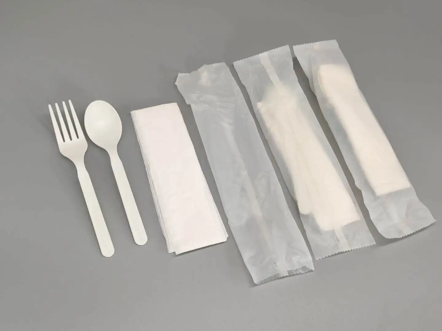 
GreenWorks degradable eco-friendly cutlery with Napkin ,white or black CPLA plastic fork and spoon dinnerware sets 