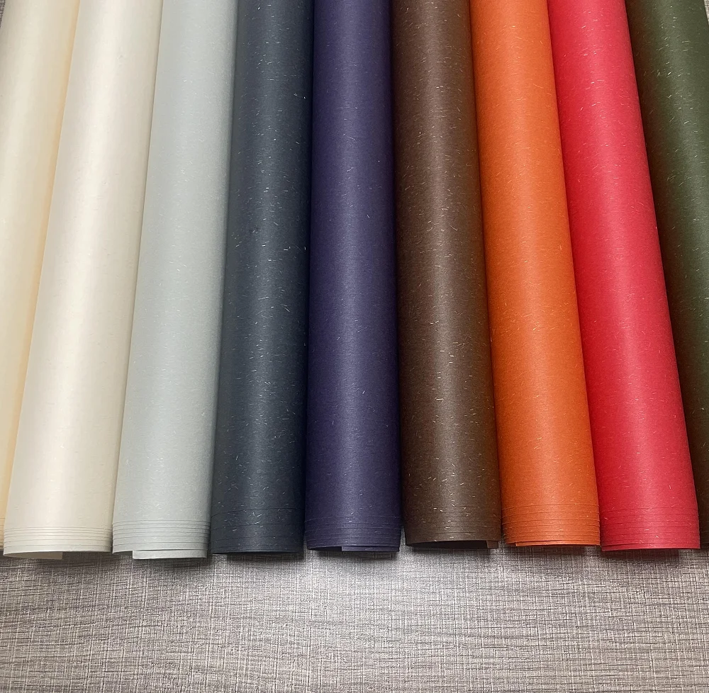 Qiang Qiang paper Low cost fancy paper embossed  rough feeling paper for Packaging