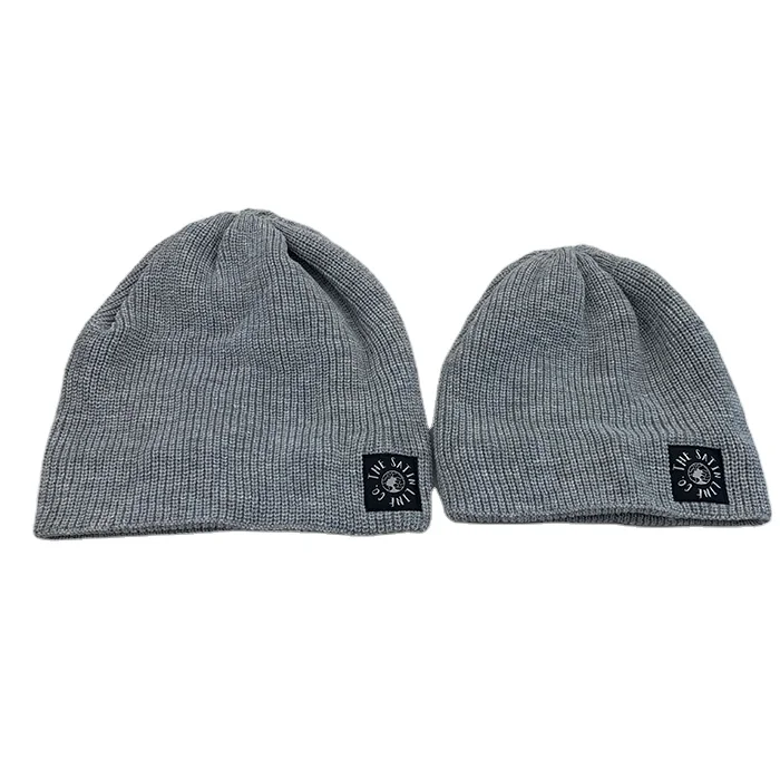 Solid Color Custom woven label Logo Rib Winter Knitted Hats Outdoor Warm winter hat Customize Beanies for Women And Men