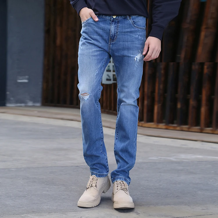 GuangXi Factory Supply Custom Slim Fit Low Rise Damage Jeans for Men Ripped Acid Wash Denim Jeans