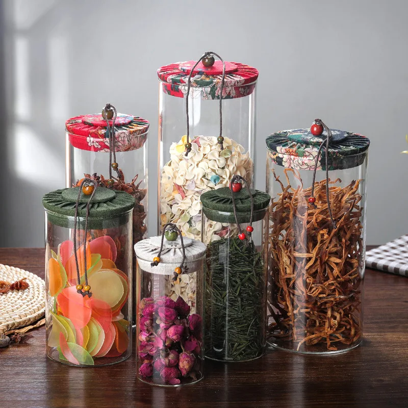High quality fast delivery heat-resistant glass tea cabs candy storage jar food grade container borosilicate jars cloth cover
