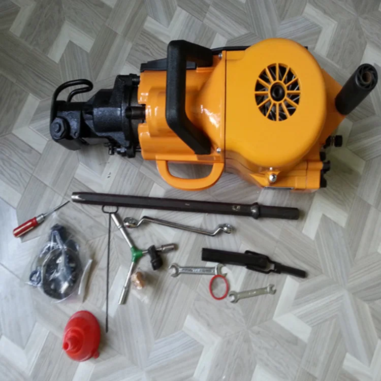 Portable hand-held petrol jack hammer YN27c for rock drilling