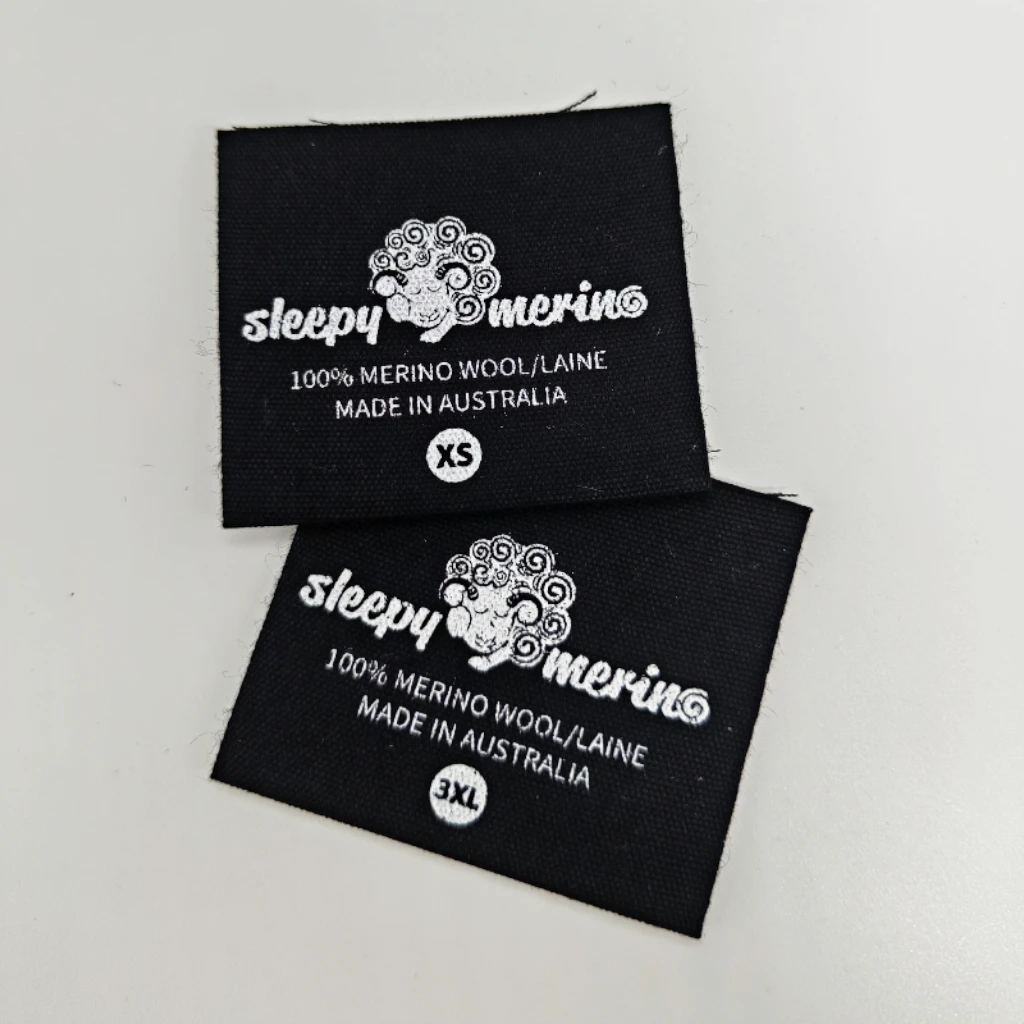wholesale black t shirt fabric size label tags plain folded stain texture woven label high density woven clothing labels