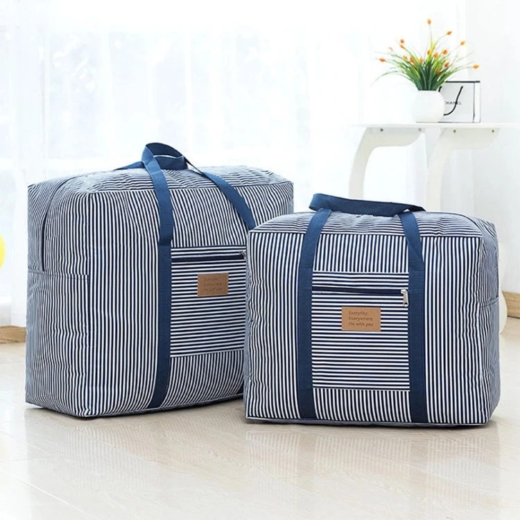 Free sample  multifunctional striped handheld clothes quilt Large oxford storage bags for travel luggage