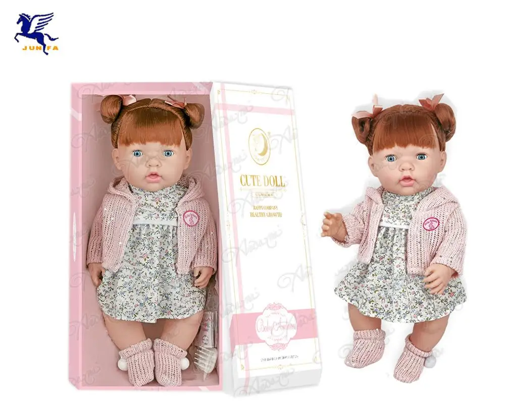 Import pretty silicone lifelike girls doll with beautiful dress can drink water and pee funtion doll toys