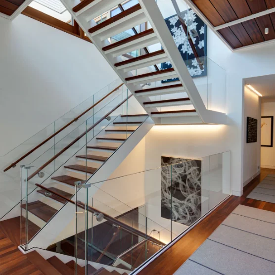 Viko Stylish And Modern White Piano Lacquered Stairs With LED Lights.