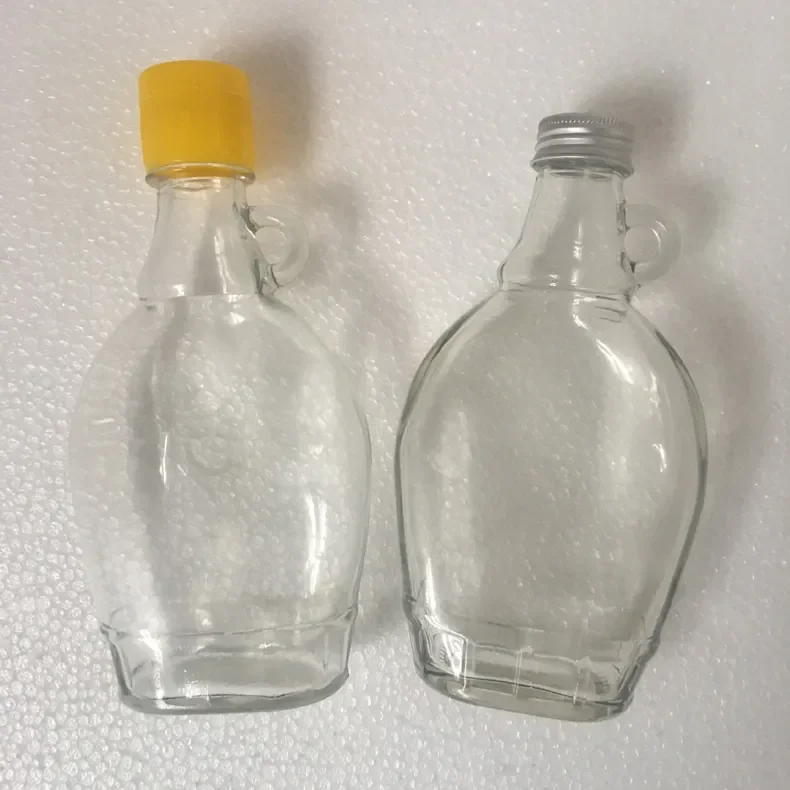 wholesale 12 oz Maple Syrup Bottles Glass Maple Syrup Bottles with Loop Handle with Black Ribbed PE Lined Caps
