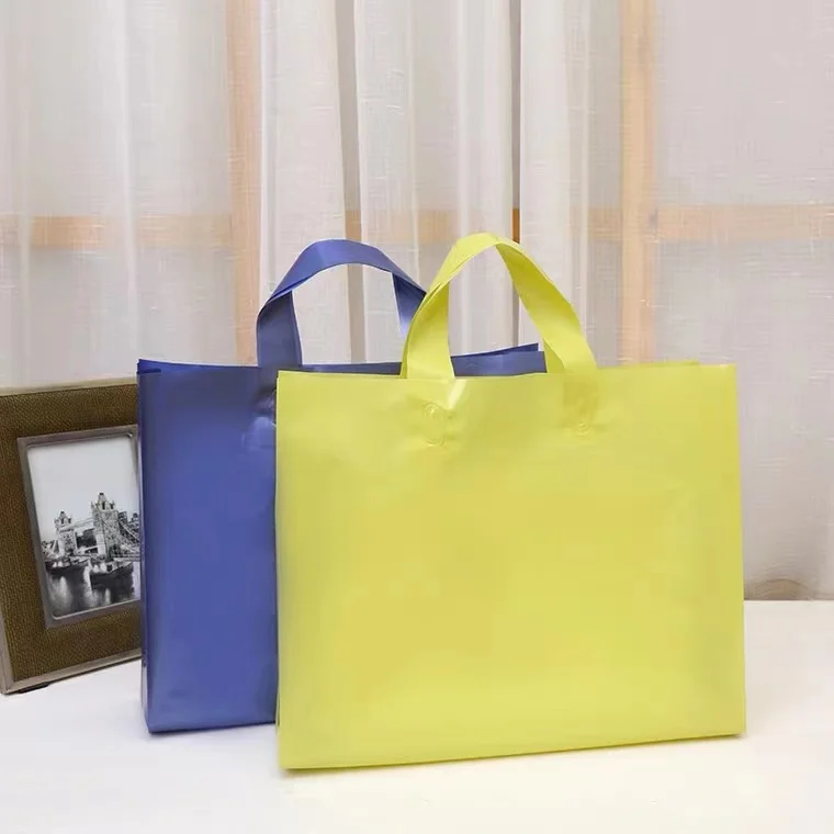 Custom plastic shopping gift bags pink for clothing custom logo foldable shopping bag reusable pe plastic bags for shops