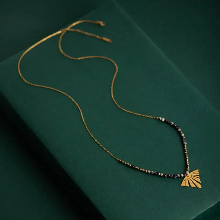 20102114 Stainless steel beaded necklace American fashion banana leaf hollowed out pendant sweater chain for party