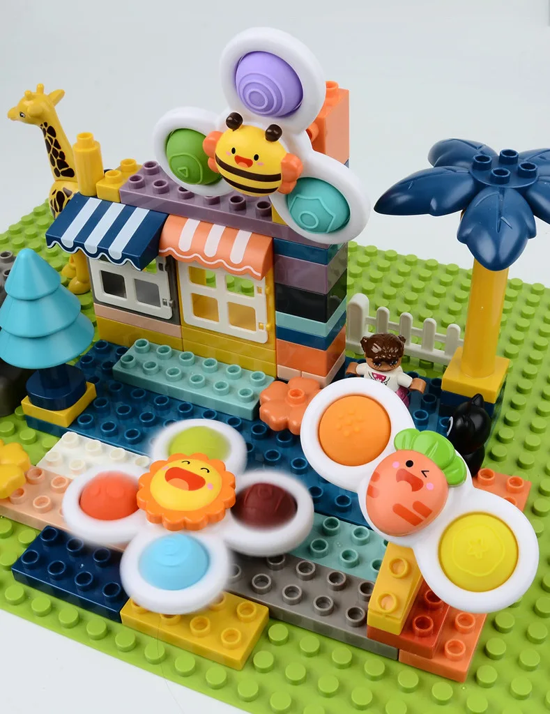 Amazon hot selling cartoon sucker fingertips turn music fidget sensory toys kids educational toys fidget toys set