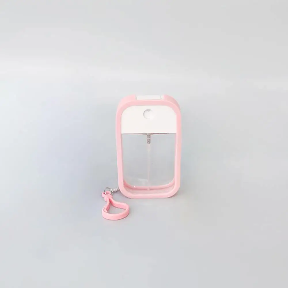 Custom Portable Travel 50ml Refillable Empty Plastic Spray Bottles Card Perfume Atomizer with Silicone Case Keyring