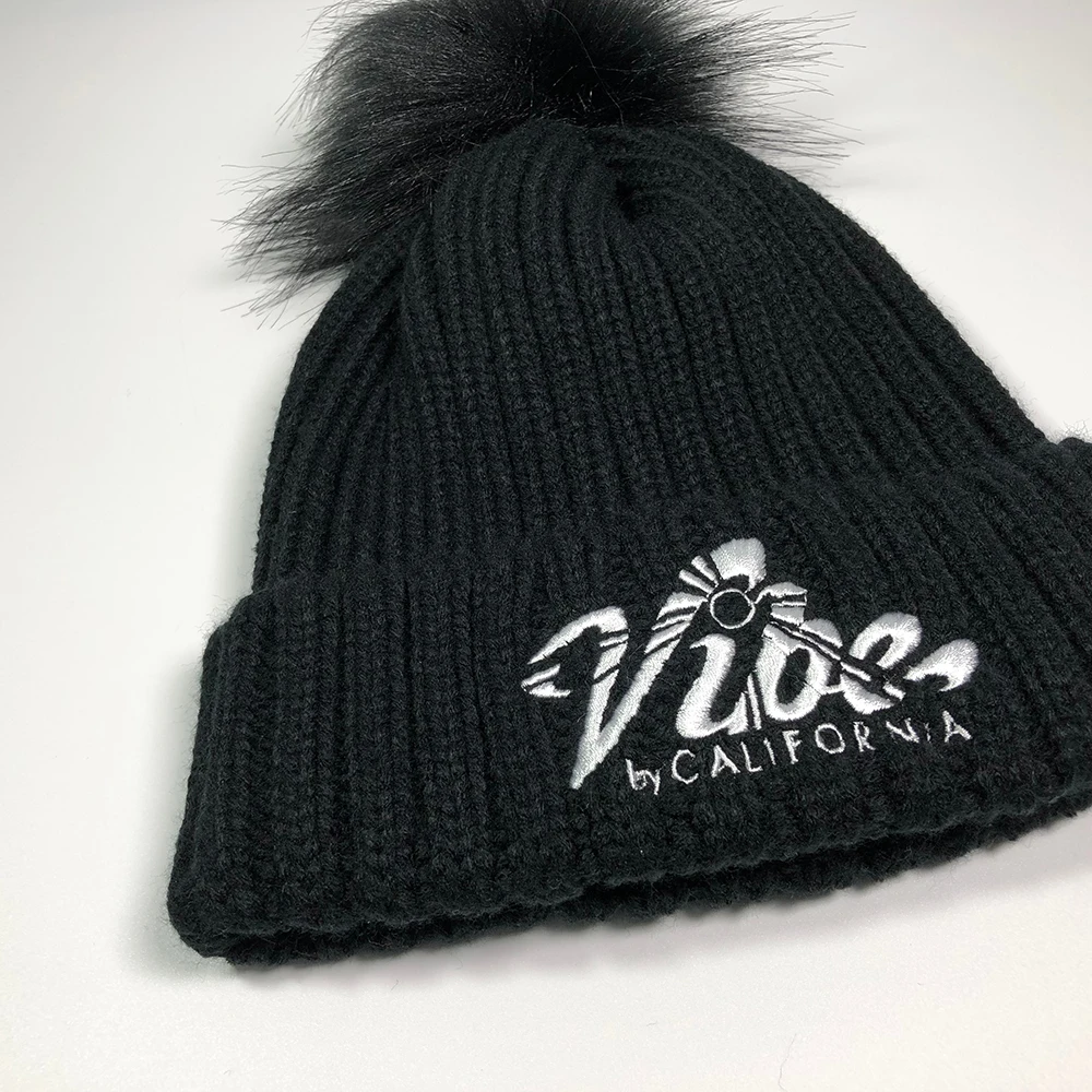 High quality knitted fur pompom for beanies Skull warmer acrylic bobble caps Custom embroidered ribbed cuff faux fur hat women