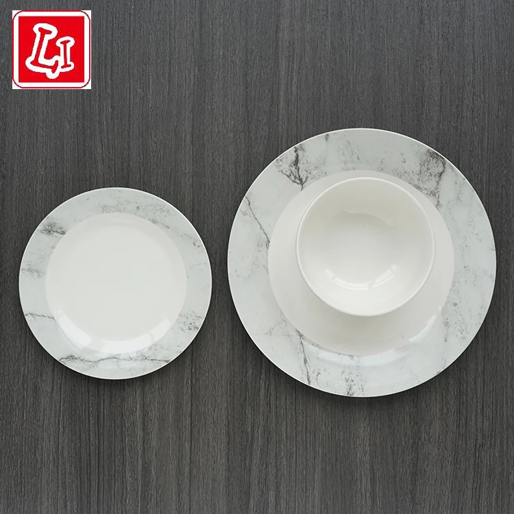 
The grey marble three piece set contains a flat rice bowl ceramic tableware set 
