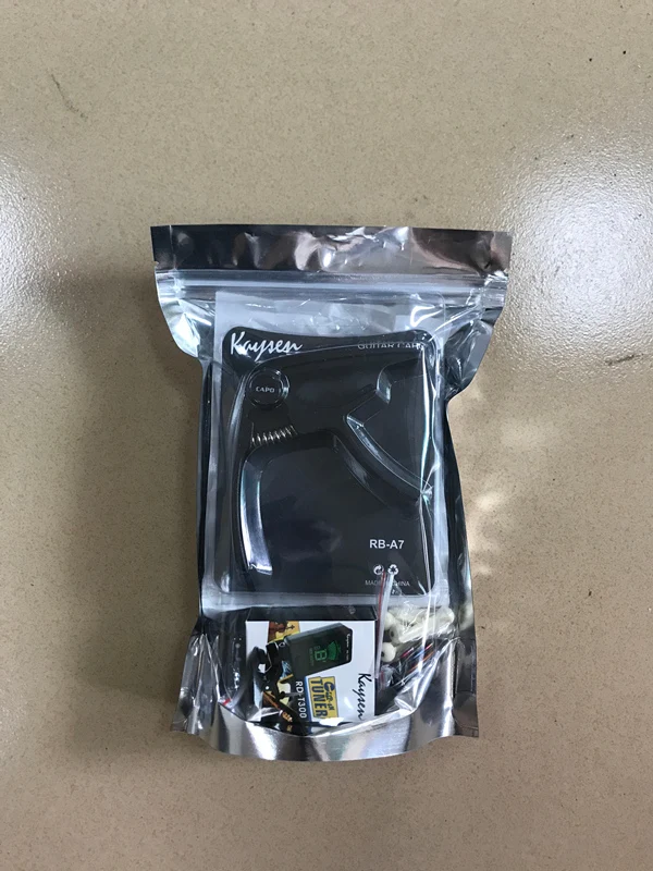 wholesale guitar bundle accessories kit set : acoustic strings ,picks,capo,tuner,strings cutter all in one pack