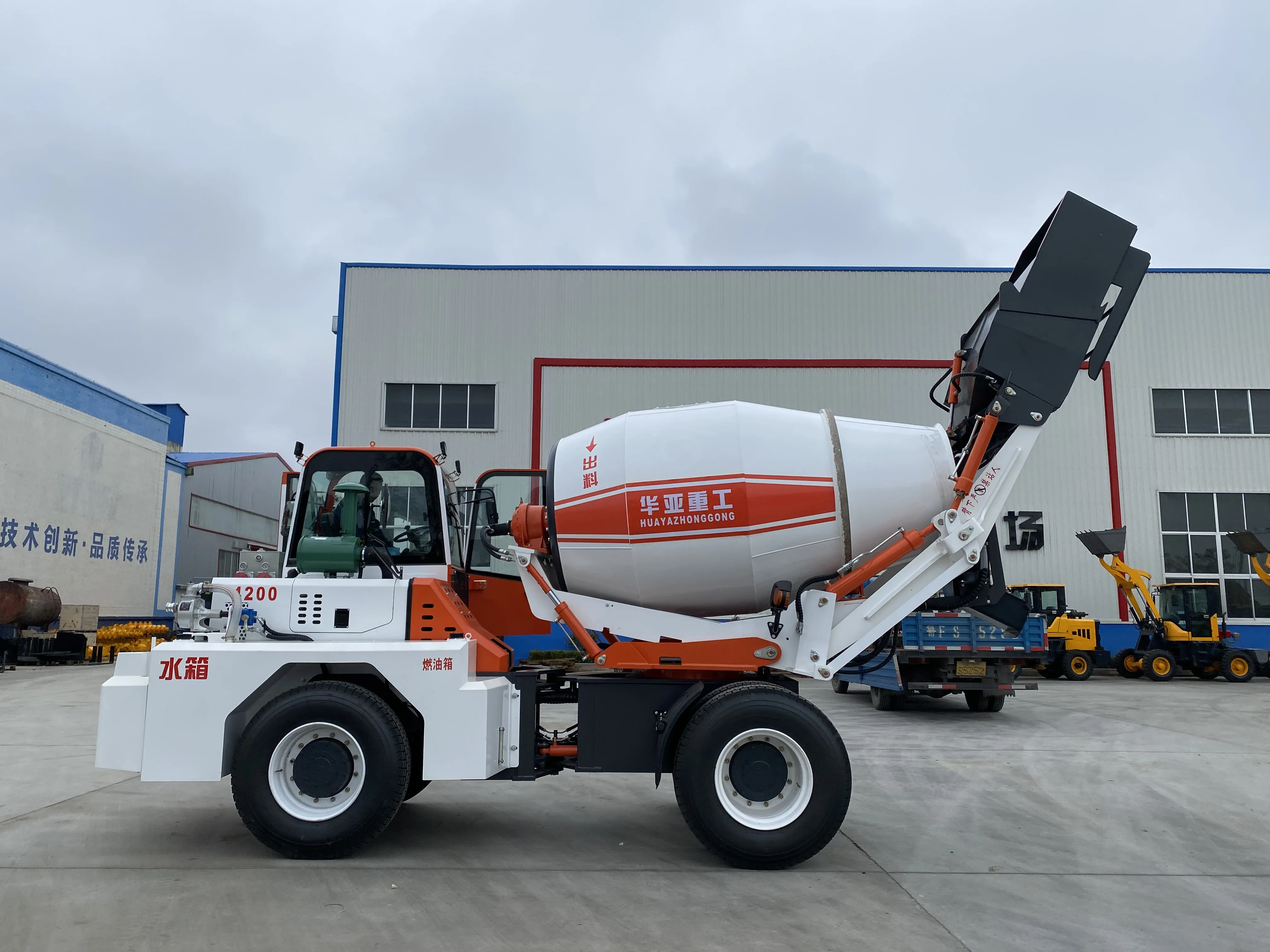 Most popular HUAYA 270 degree rotation self-loading concrete mixer truck auto feed 2m3 high quality Concrete mixer with Euro