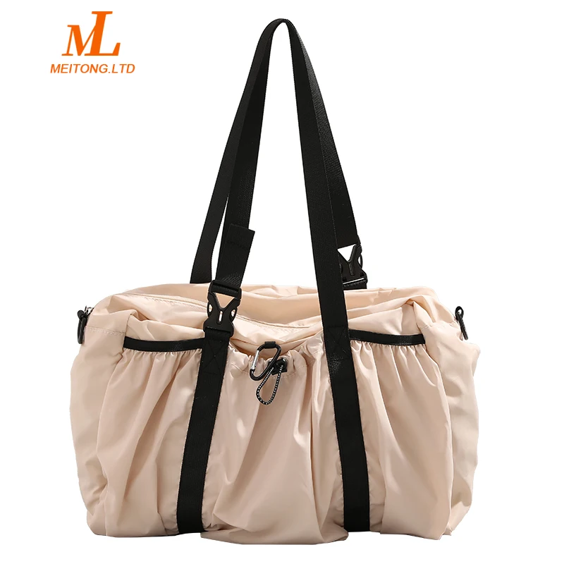 Large capacity short trip bag 2023 new simple luggage handbag casual shoulder underarm bag for women