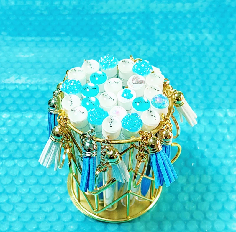 Mascara Tubes & Keychains in Silver- Add Logo with Full Colour Labels. Private Label Options for Lash Serum and Mascara. Lash Ex