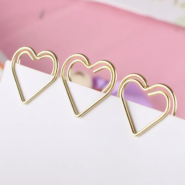 Small heart shape golden paperclip
