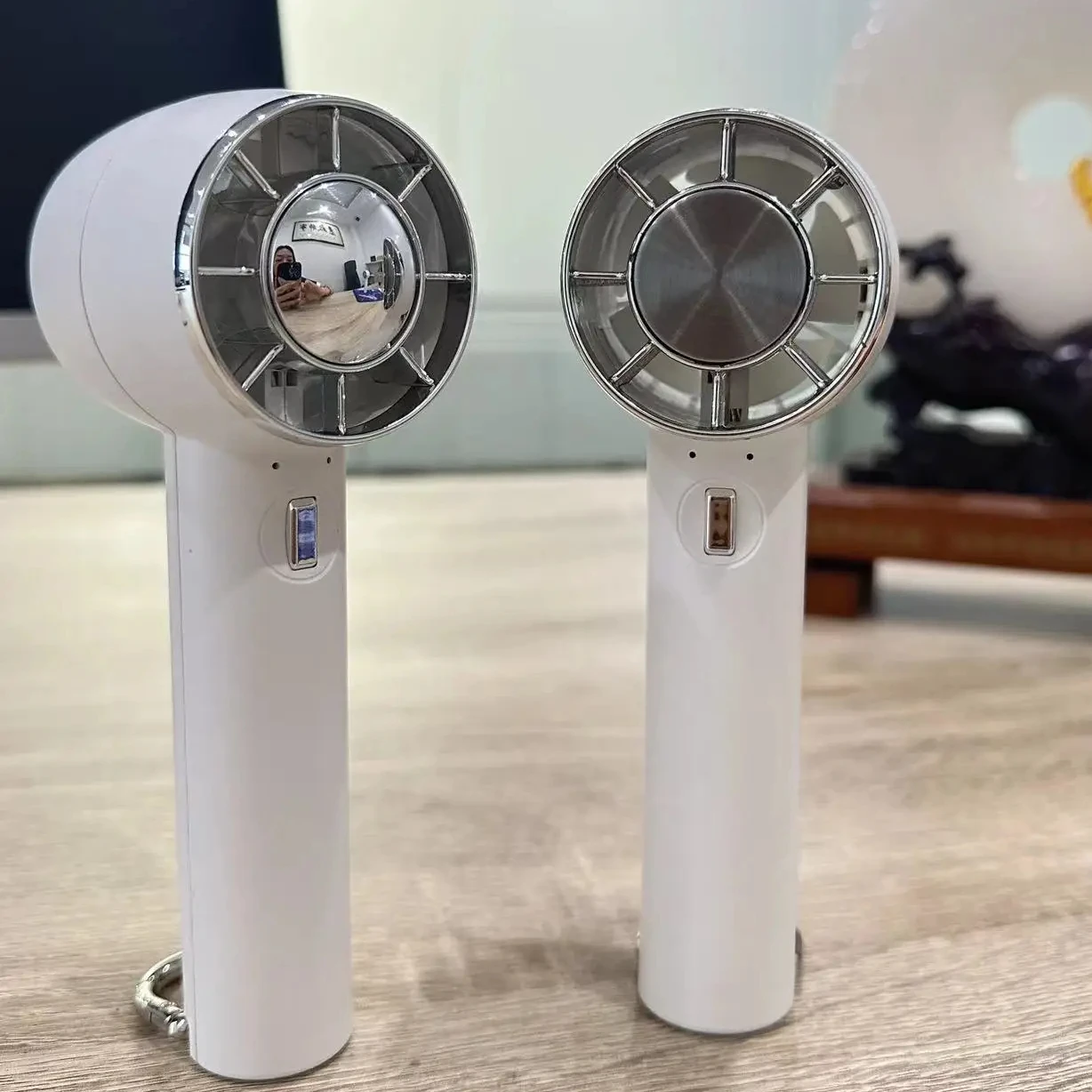 Shenzhen Factory hot sell Cold Compress bldc Fan Ice Cooling mini portable & wearable fans Handheld Fan with Hook