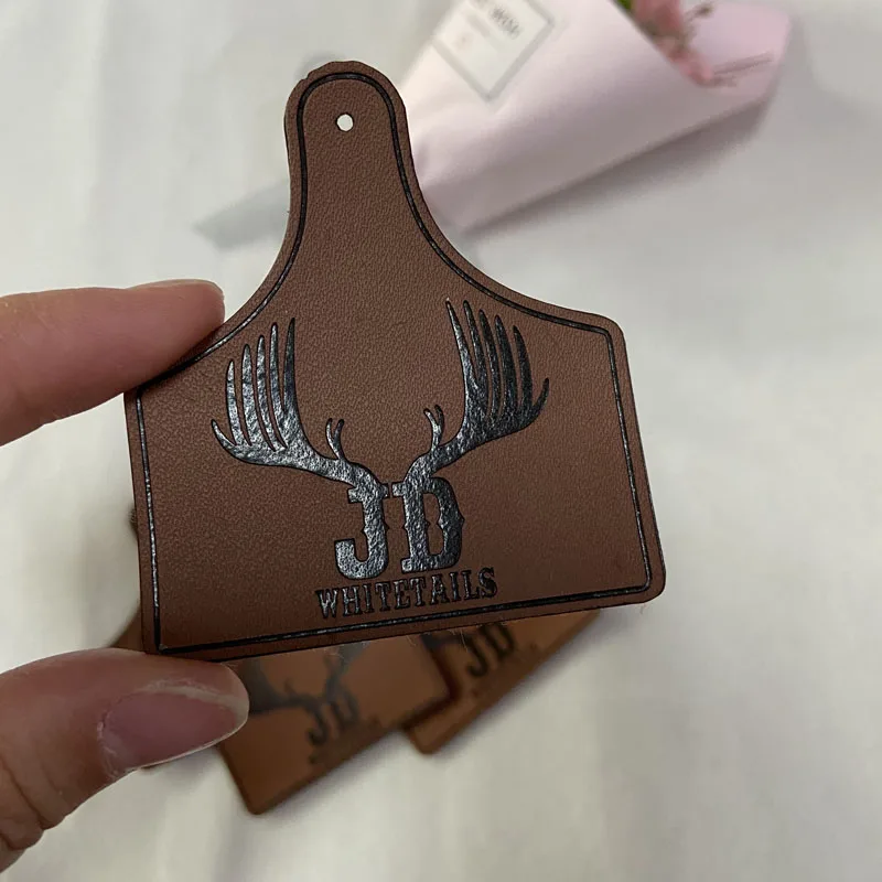 Custom garment leather patch with embossed logo,jeans PU leather label with own logo