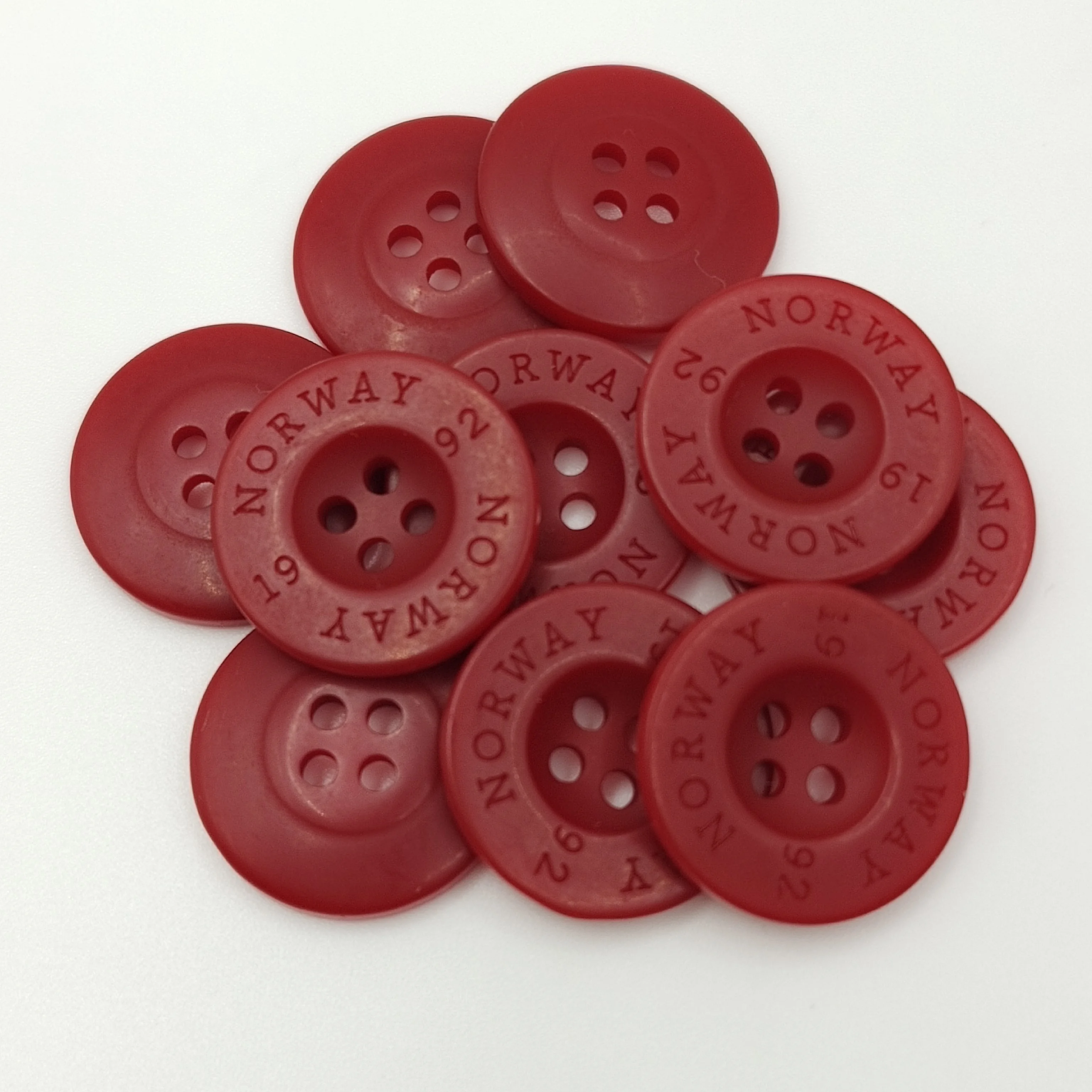 China Custom Colored  Red  bFlat 4 Holes Round Polyester Resin Big Size garment Buttons