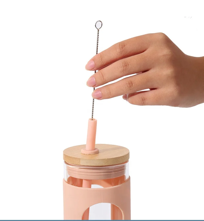 2024 Top Seller BPA Free 20oz Silicone Protective Sleeve Custom Cup Drink Glass Bottle Glass Water Tumbler With Bamboo Lid Straw