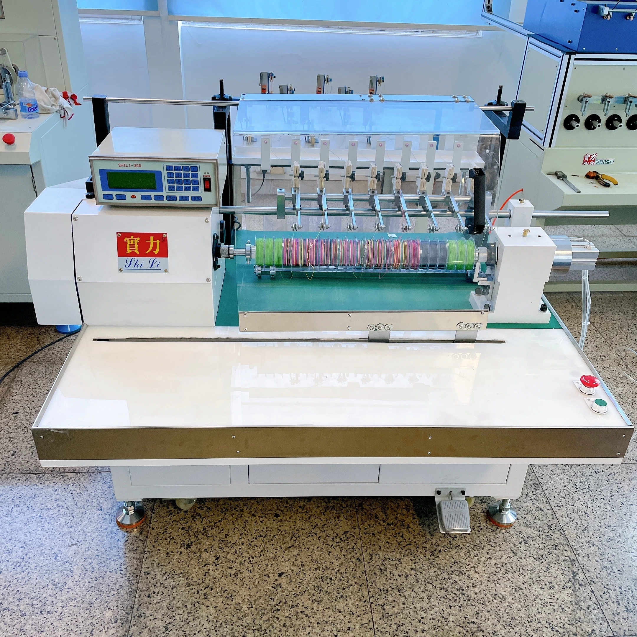 Eight spindle high production fishing line winding machine