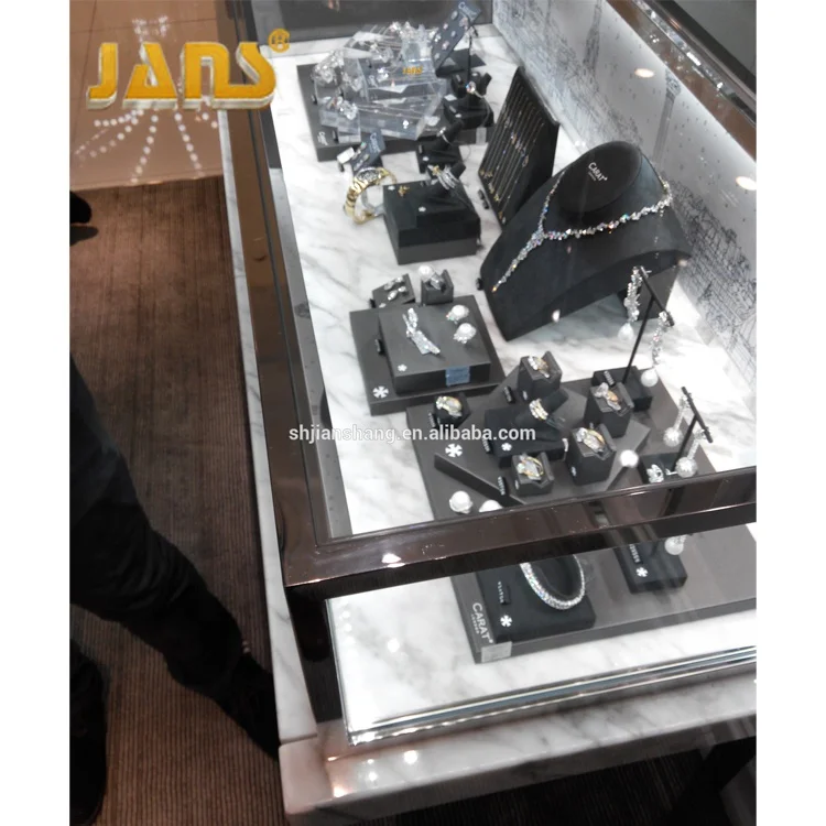 
Luxury high-grade marble curved glass jewelry display cabinet showcase with LED light 