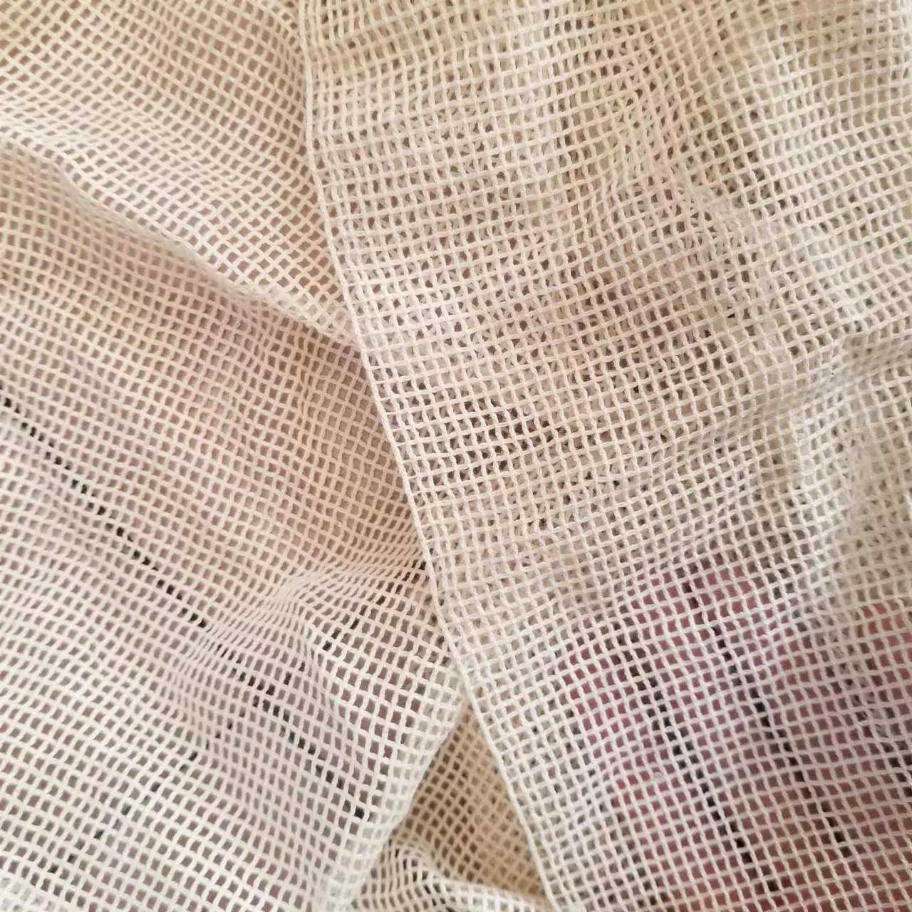 Wholesale breathable cotton mesh fabric 100% cotton warp knitted mesh fabric