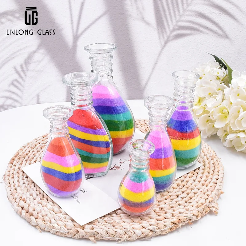 Customize a series of 40 ml to 240 ml clear decorative art  sand  glass bottle