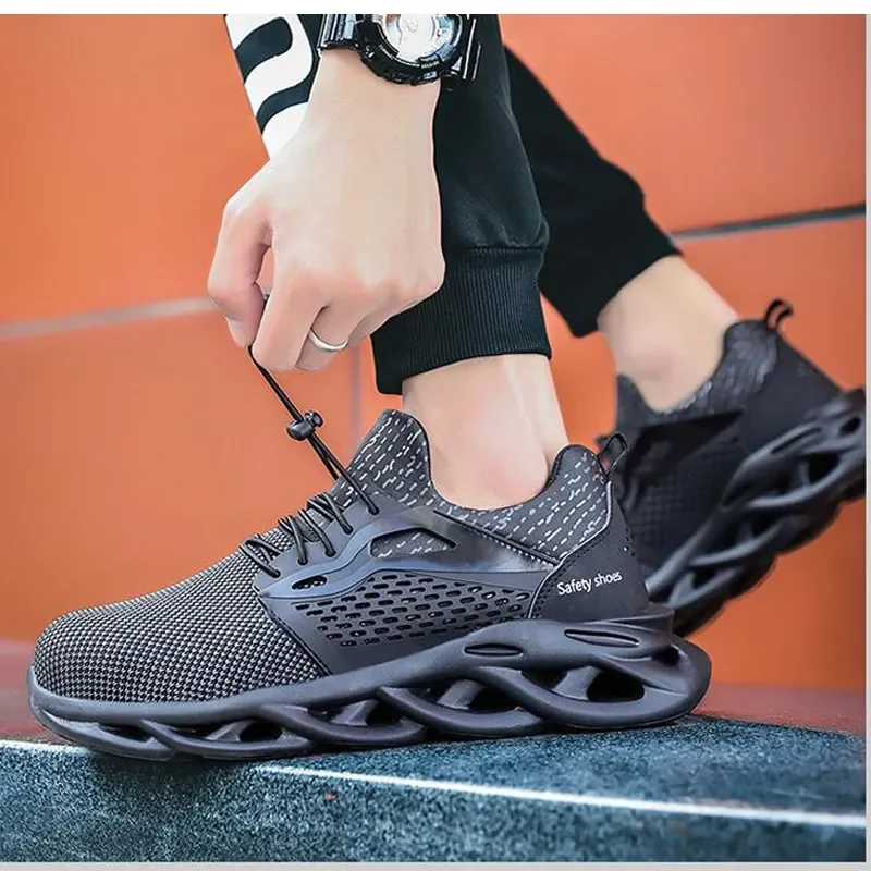Style fashion light weight Slip resistant Rubber soft sole composite toe knitted safety shoes for industrial worker