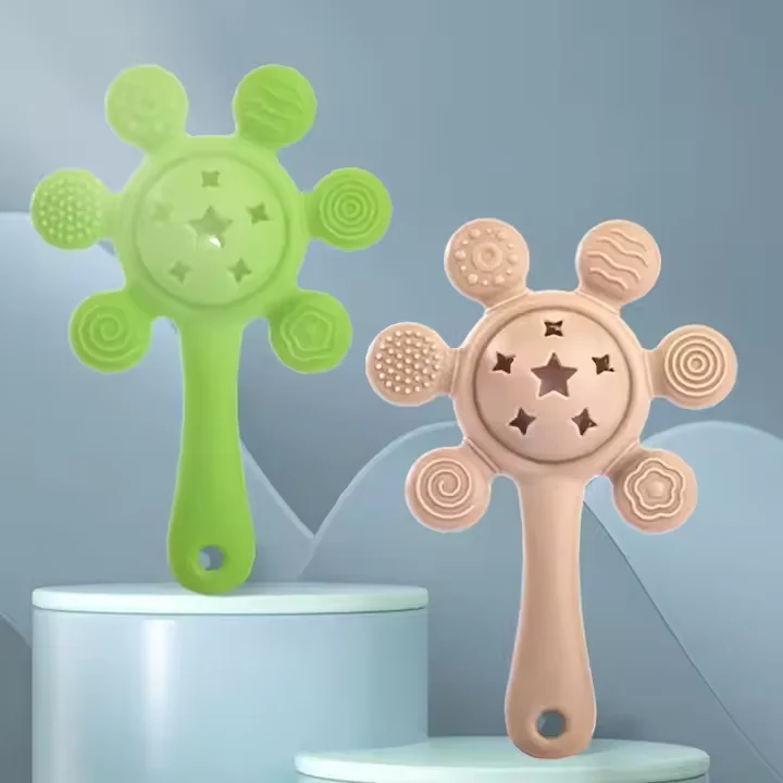 Wholesale Baby Chew Sensory Silicone Music Ring Rattle Toy Safety Baby Teething Toys Teether