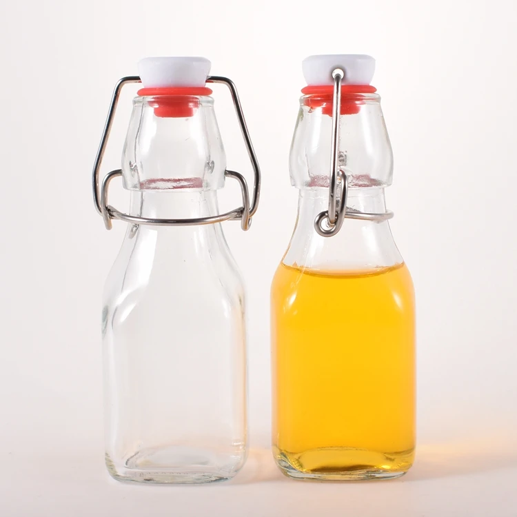 Wholesale square 130ml 140ml Mini Swing Top Small Olive Oil Bottle with Flip Rubber Stopper