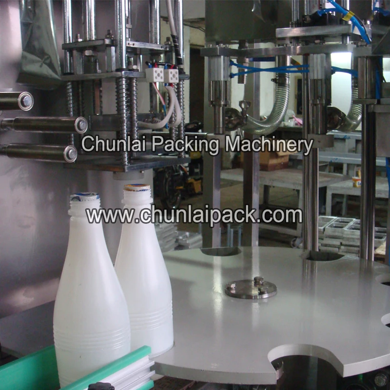 Auto Rotary Liquid Bottle Filling Sealer Custom 4 Nozzle Coconut Milk Container Foil Cutting Sealing Machine For Production Line