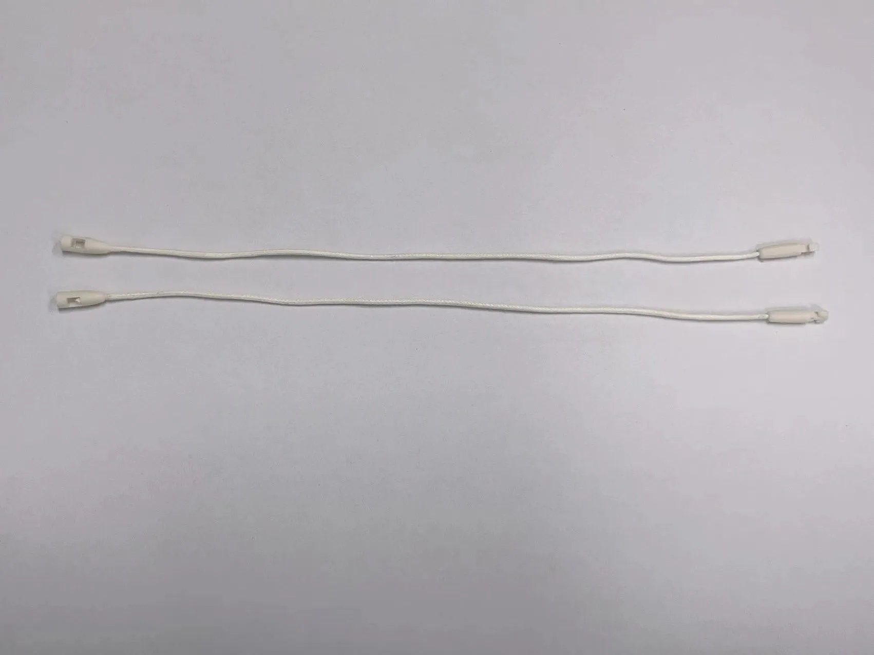 Wholesale Stock Plastic Hang Tag String for Clothing Garments Premium Stoppers for Clothing Accessories