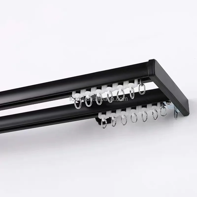 Curved curtain track and black curtain rail