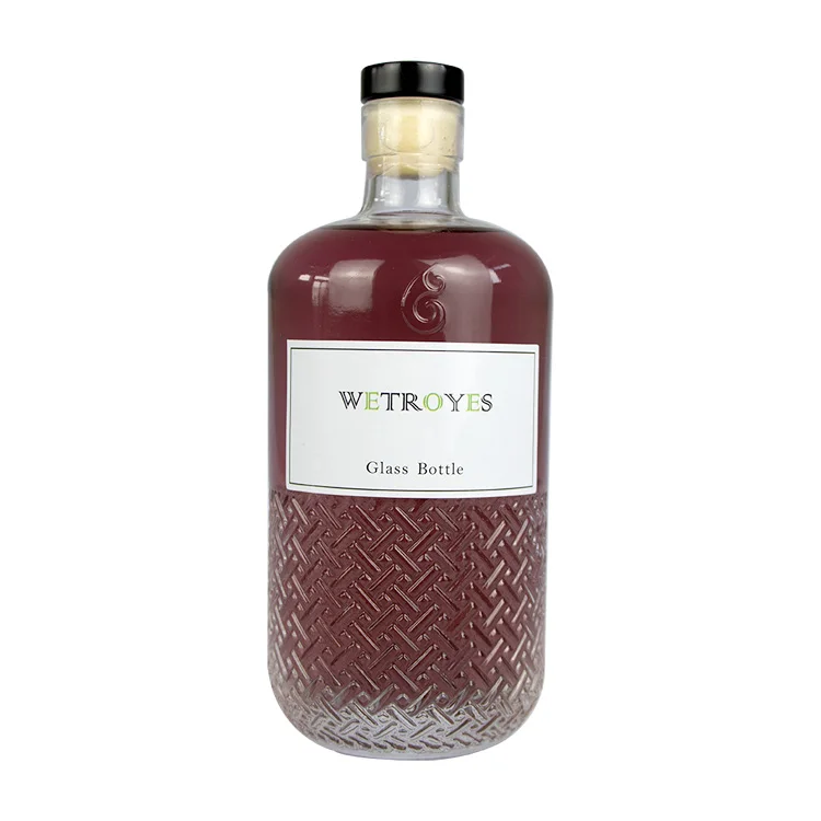 Embossed 500ml Custom Logo Empty Liquor Beverage Glass Bottle With Cork