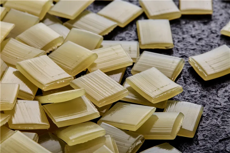 
5002 Fast Curing Adhesive Paper Box Hot Melt Adhesive Particles Yellow Flake 