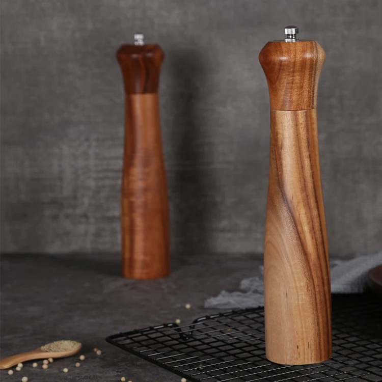 Pepper grinder made of acacia wood and constructed with ceramic core and stainless steel hardware, which makes it use easily