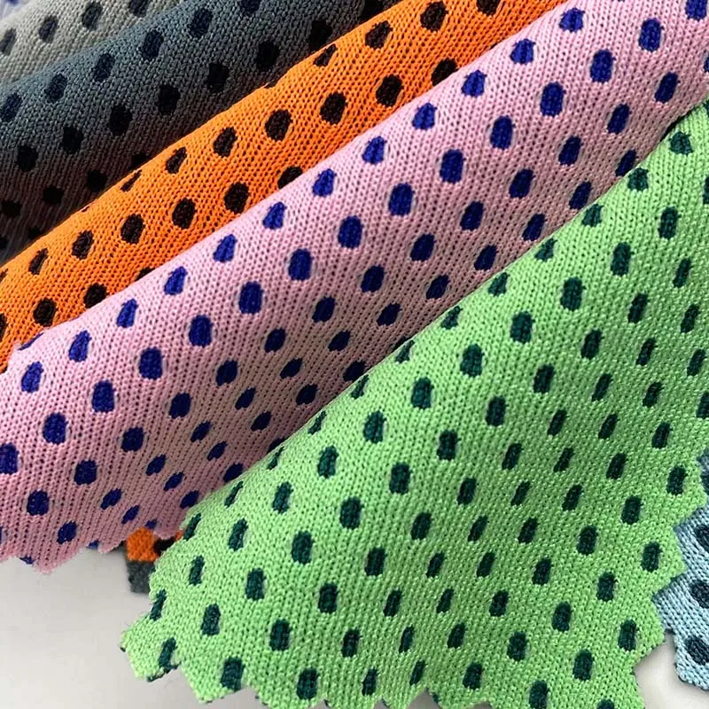 Sustainable football/basketball jersey Dry Fit 100 polyester knitted yarn-dyed Cation honeycomb mesh fabric 150gsm