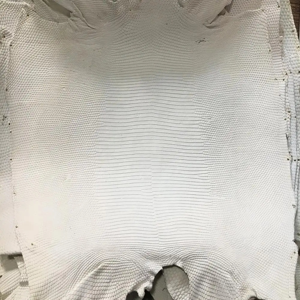 Bleached back cut lizard skin in crusts with 33-37cm width for bags