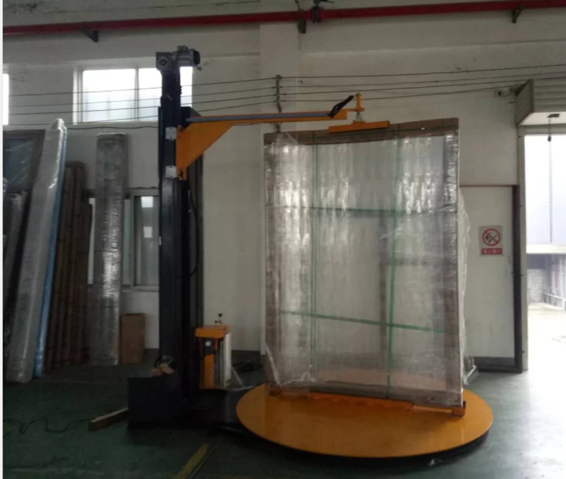Top plate pre-stretch pallet door wrapping machine