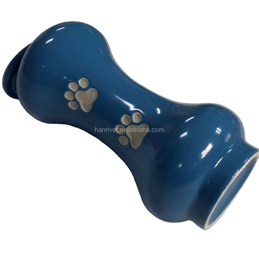 Best selling ceramics bone shape pet urns casket with hand paint paw mark for pets ashes with cover