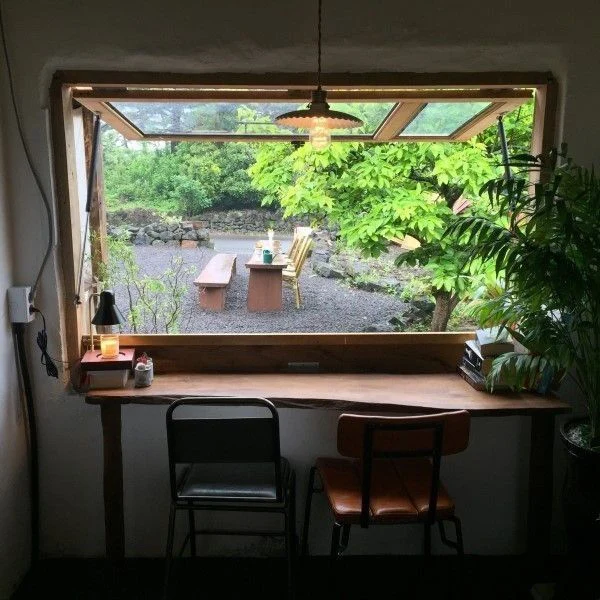 Kitchen servery awning window with gas strut