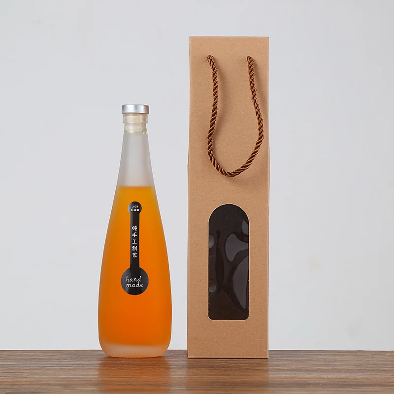 
330ml frosted glass cork wine bottle with independent package and kraft paper bag 