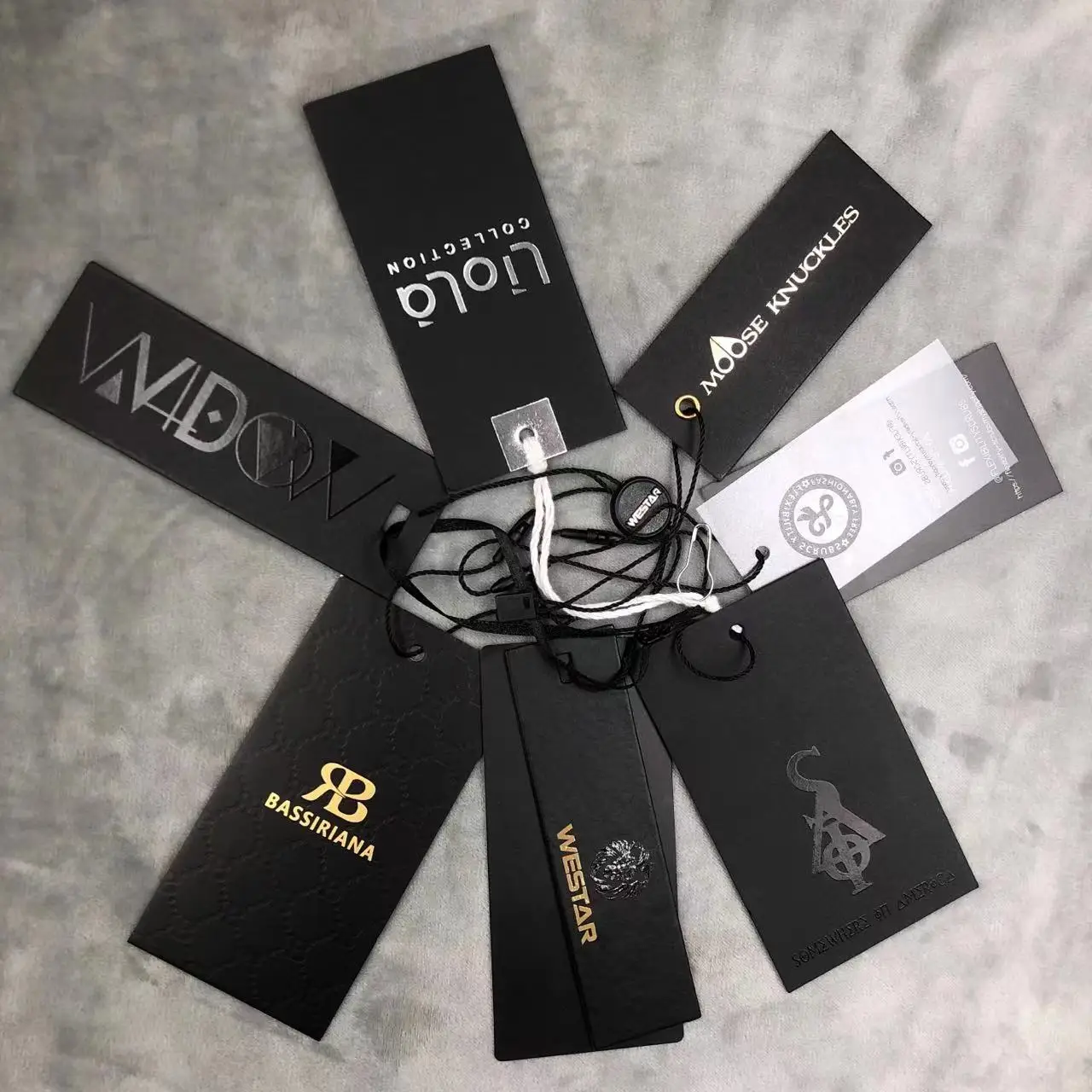 Wholesale Luxury UV Heavy  Black Cardboard Swing Tag Textured Golden Stamping PVC Garment Hang tag