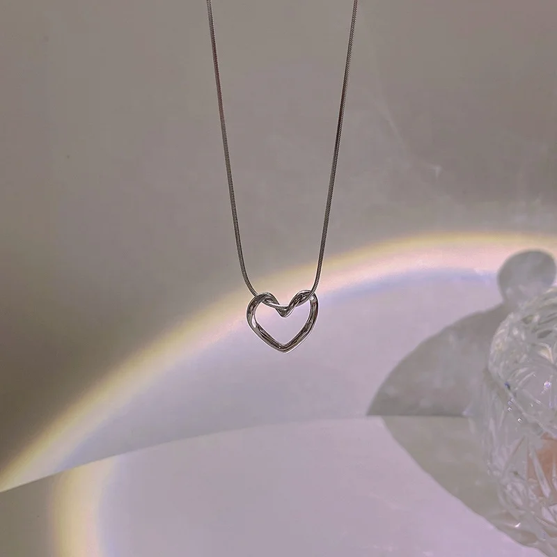 2022 Chic Design Silver Hollow Heart Pendant Necklace Snake Chain Titanium Steel Light Luxury Niche Design Heart Necklace For Gi
