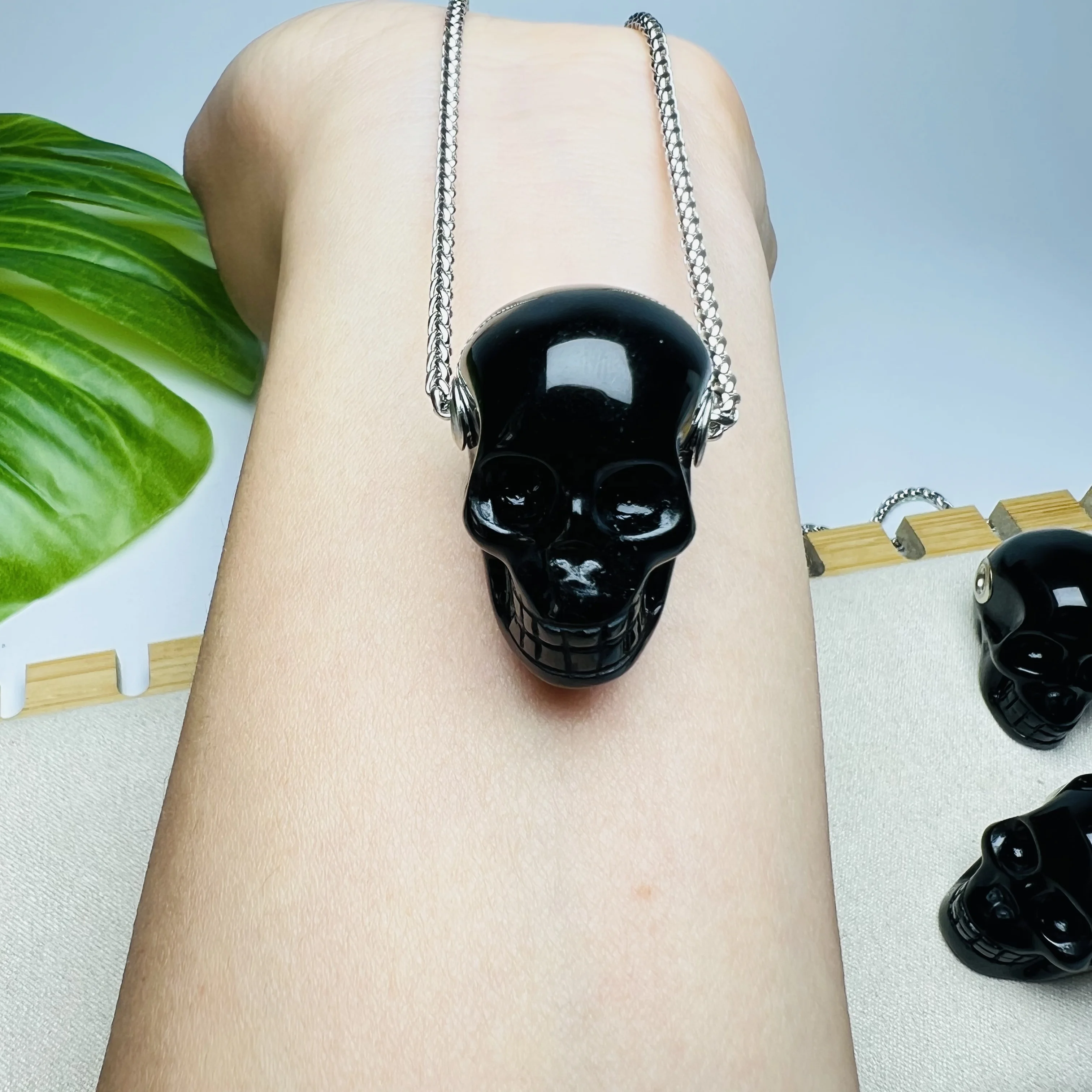 Bulk wholesale high quality hand carved natural black Obsidian crystal skulls pendant for decoration